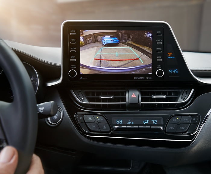 Front-facing image of the 2019 C-HR Limited infotainment system with black interior fabric.