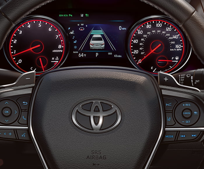 Interior shot of 2019 Camry in black with detailed view of MID.