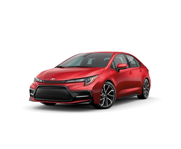 Exterior 7/8 front driver side view of 2020 Corolla SE 6MT in Barcelona Red Metallic.